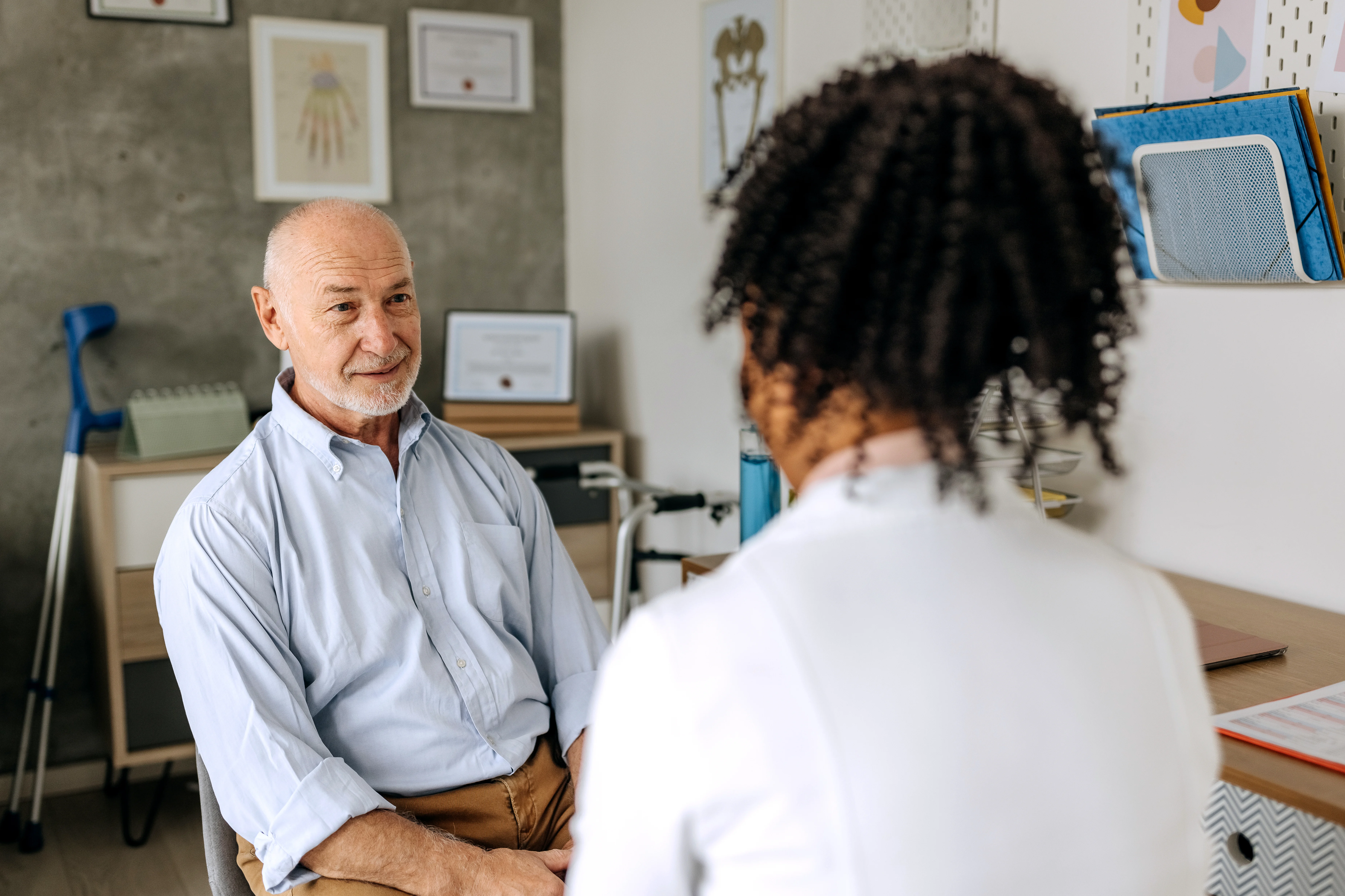 a doctor talking to a patient