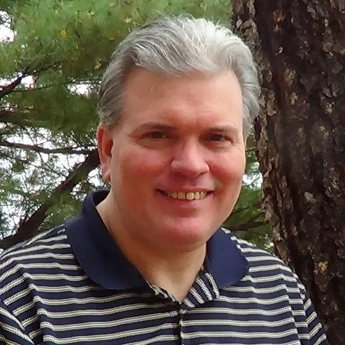 a person smiling for the camera