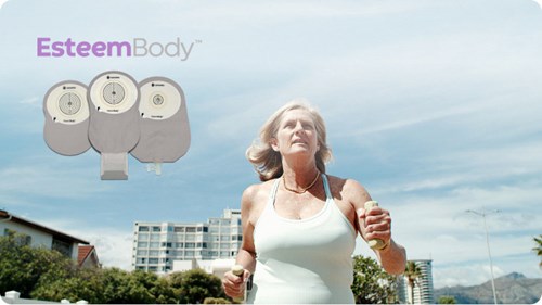 An image introducing Esteem Body™ as a new one-piece soft convex ostomy system with Leak Defense™, with a woman holding dumbbells while jogging in the image background.